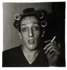A young man in curlers at home on West 20th Street, NYC