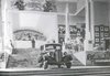 Soviet Pavillion interior view with ZIS automobile; Exposition Internationale des Arts et des Techniques appliqués à la vie moderne, Paris 1937: Rapport generale, vol 10. plate 74