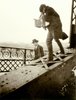 Alfred Stieglitz Photographing on a Bridge