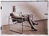 Untitled (Woman [Lis Beyer or Ise Gropius] in B3 Club Chair by Marcel Breuer wearing a mask by Oskar Schlemmer and a dress in fabric designed by Breyer)