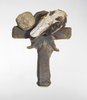Unchristian cross with kneecap and hare's skull