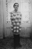 Louise Bourgeois wearing a latex costume that she designed and made, 1970